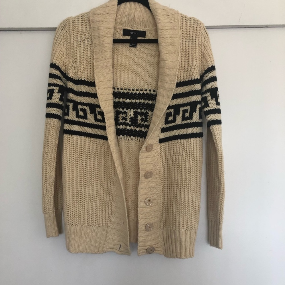Sweater cardigan with geometric details